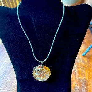 Mother of pearl shell rose necklace.